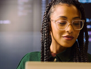 Person coding on computer