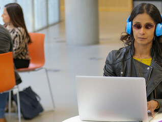 Blind student using laptop