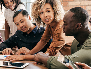Student group working together at a table
