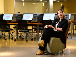 woman in chair in computer lab