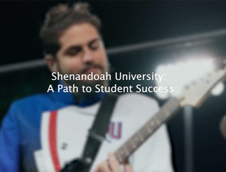 Student playing guitar