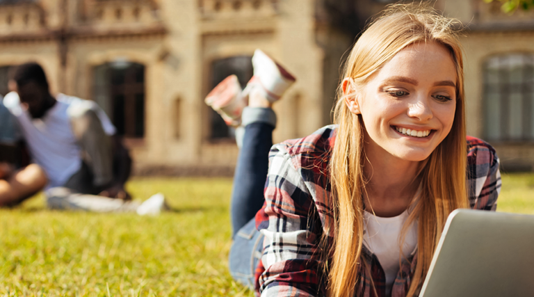 Girl enjoying outside wifi