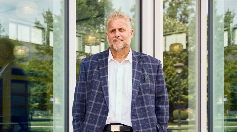 Posed photograph of Ray Stanley on the Marian University campus