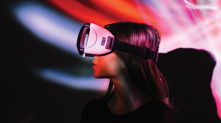 Side view of a person wearing a VR headset