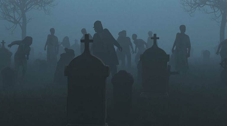 Silhouetted zombies rise from a foggy graveyard