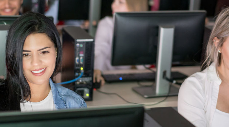 Students using computers in a classroom