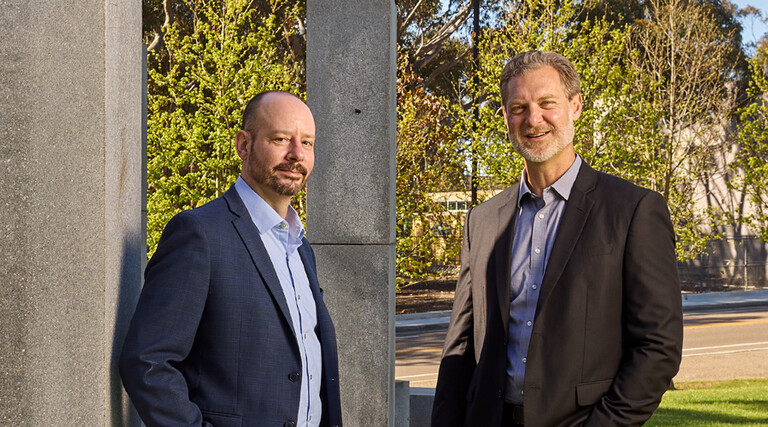 Daniel Suchy and Brett Pollak pose for a photo at the University of California, San Diego