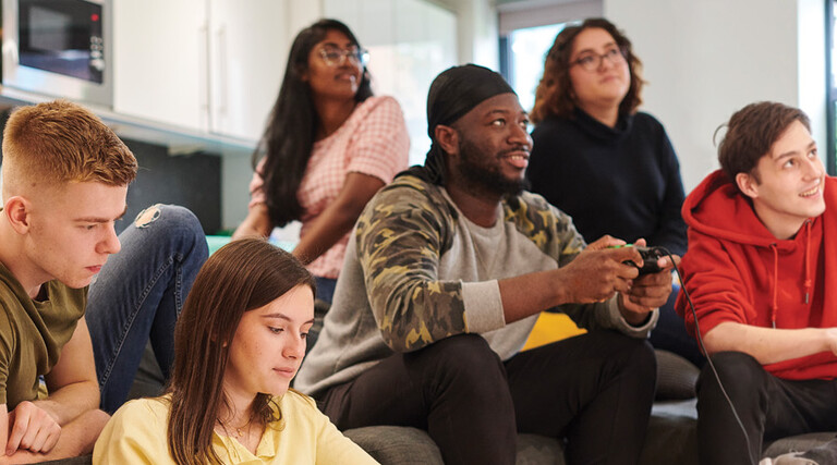 Students in a dorm room 
