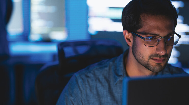 Person working on computer in the office