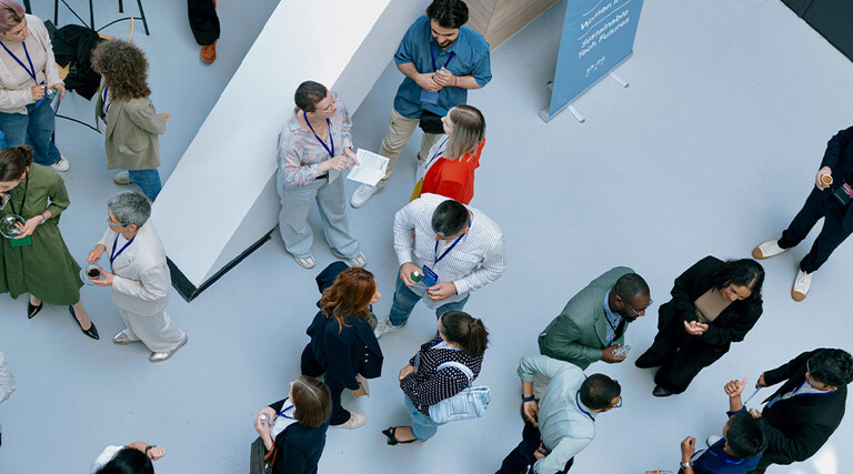 People networking at a conference
