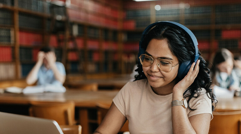 Student working in a library