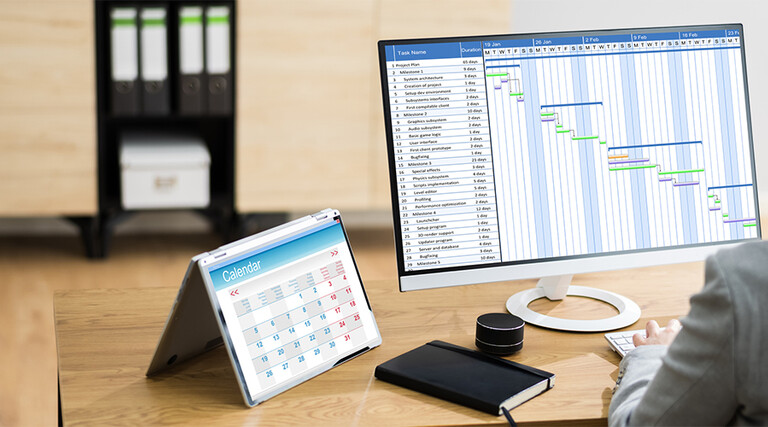woman doing project management at a computer