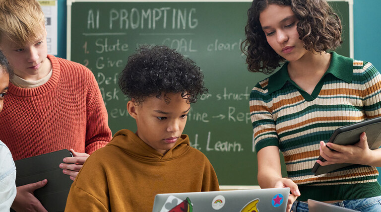Students using computer in class