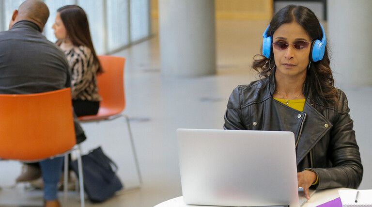 Blind student using laptop