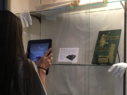 washcoll girl uses AR to study an artifact