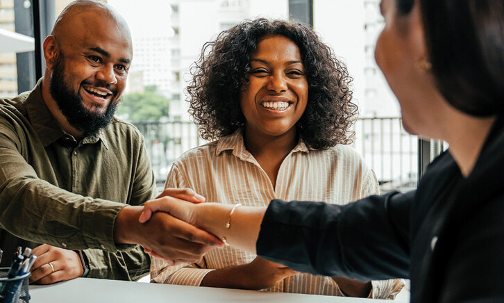 People meeting and shaking hands