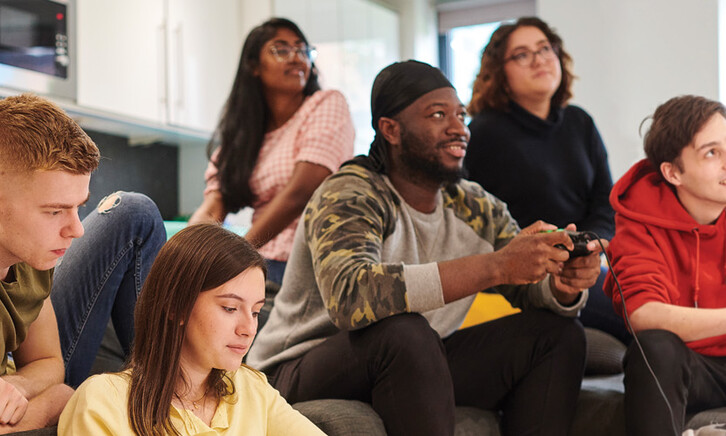 Students in a dorm room 