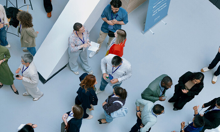 People networking at a conference