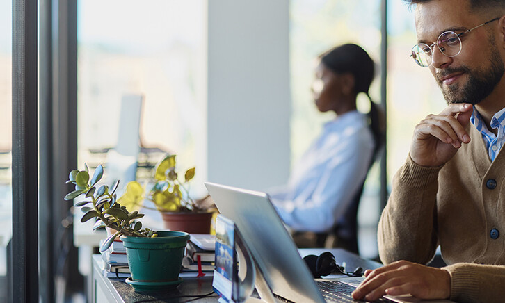 Man working on a computer in an office