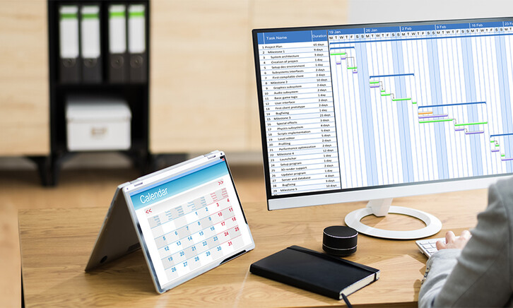 woman doing project management at a computer