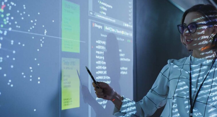 Person reviewing data in meeting