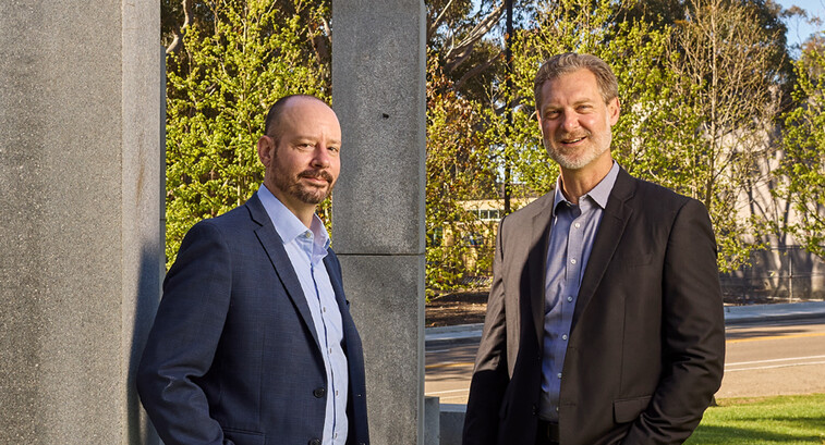 Daniel Suchy and Brett Pollak pose for a photo at the University of California, San Diego