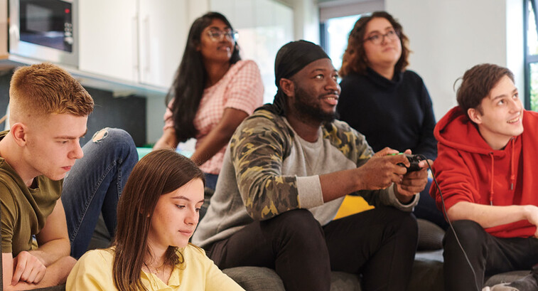 Students in a dorm room 
