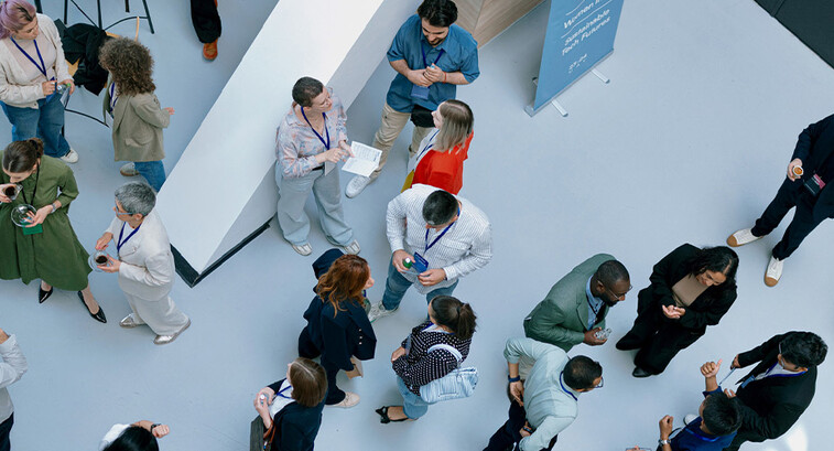 People networking at a conference