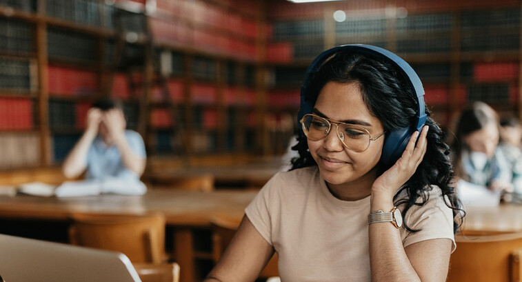 Student working in a library