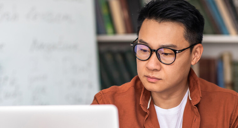 Student taking notes