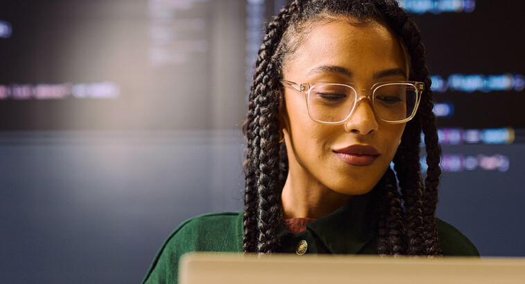 Person coding on computer