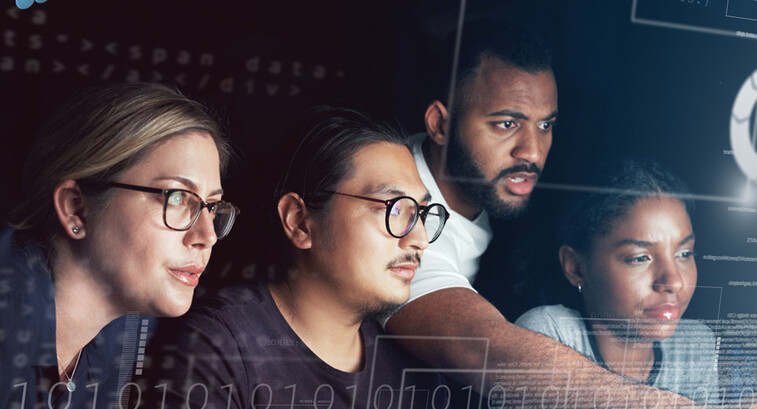 People working on computer together 