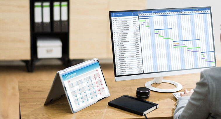woman doing project management at a computer