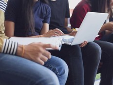 An image of students at work on their devices