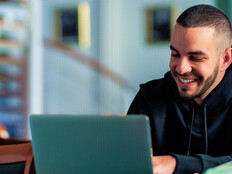 Person working on laptop in the office