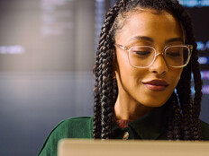 Person coding on computer