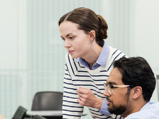 IT team looking at computer