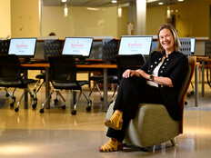 woman in chair in computer lab
