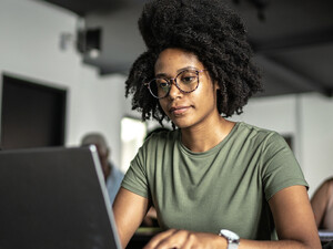 Student using computer in class