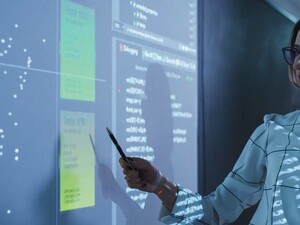 Person reviewing data in meeting