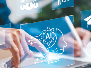 Some tech-looking icons superimposed over a person's hands on a laptop