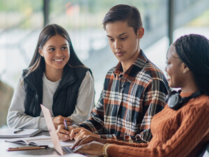 Students collaborating in class