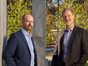 Daniel Suchy and Brett Pollak pose for a photo at the University of California, San Diego