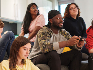 Students in a dorm room 