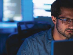Person working on computer in the office
