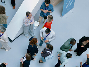 People networking at a conference