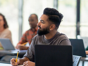 Person listening to lecture in classroom
