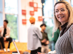 Person working on computer on campus