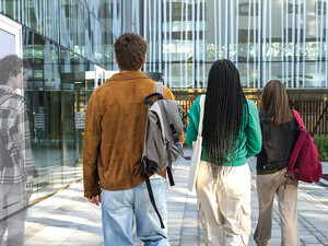 Group of students. One having transparent, ghost-like appearance.