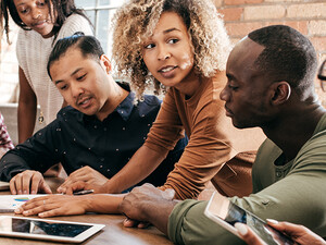 Student group working together at a table
